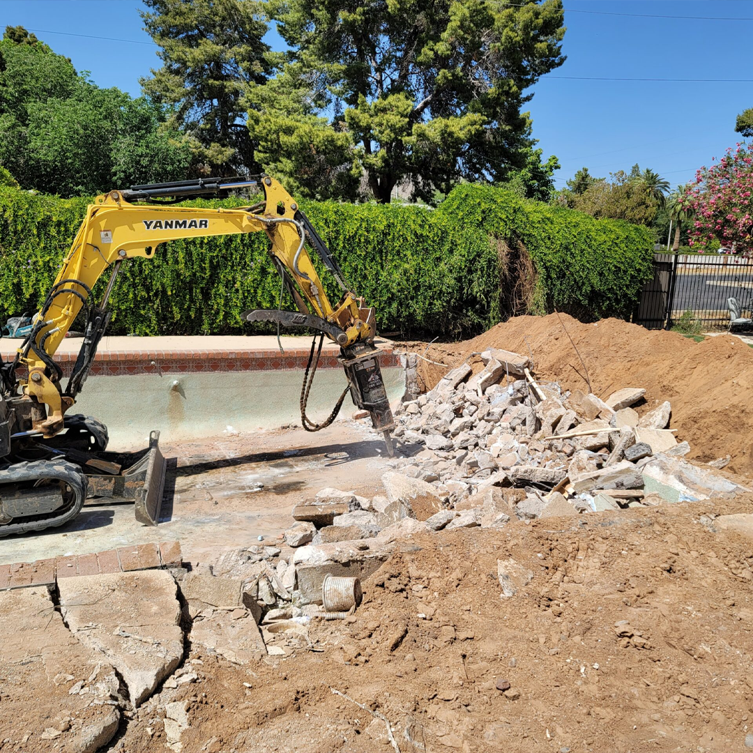 Compacted pool backfilling and dirt grading restorations